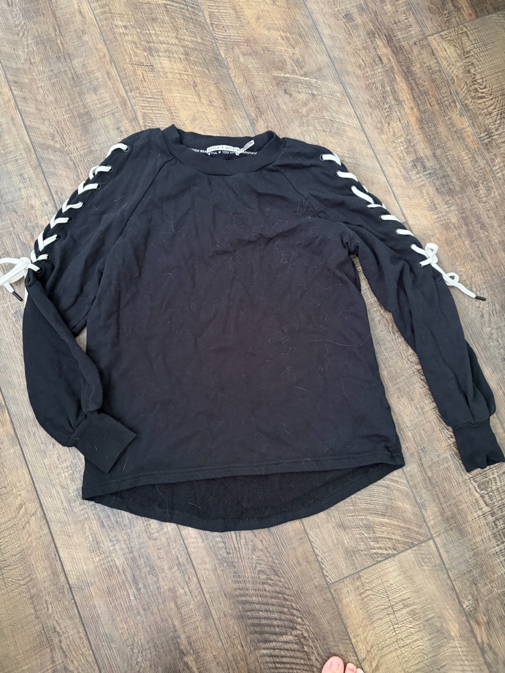 Alice + Olivia Black Crewneck Sweater with White Lace-Up Sleeves